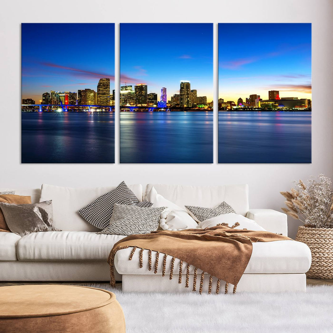 The living room features a Miami City Wall Art Canvas Print—a gallery-wrapped triptych displaying a city skyline at dusk, adding museum-quality elegance to the space.