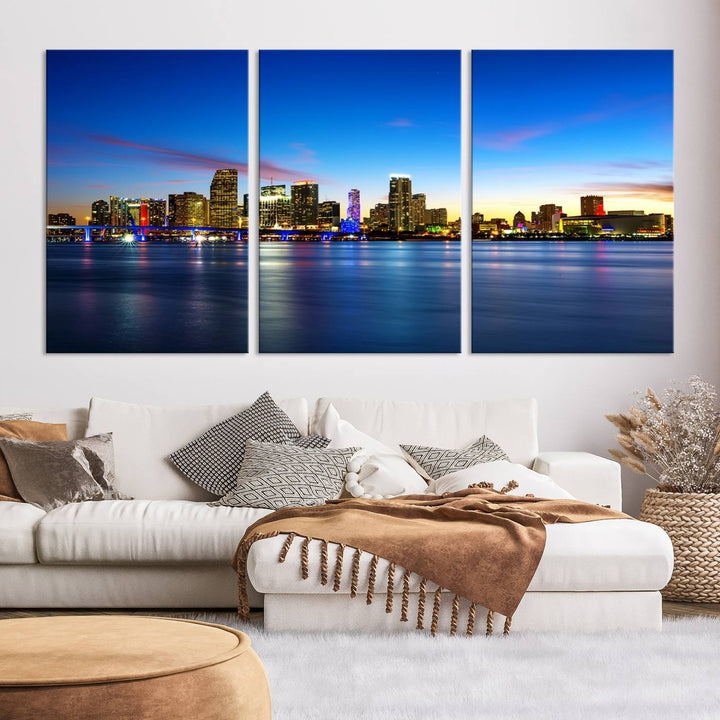 The living room features a Miami City Wall Art Canvas Print—a gallery-wrapped triptych displaying a city skyline at dusk, adding museum-quality elegance to the space.