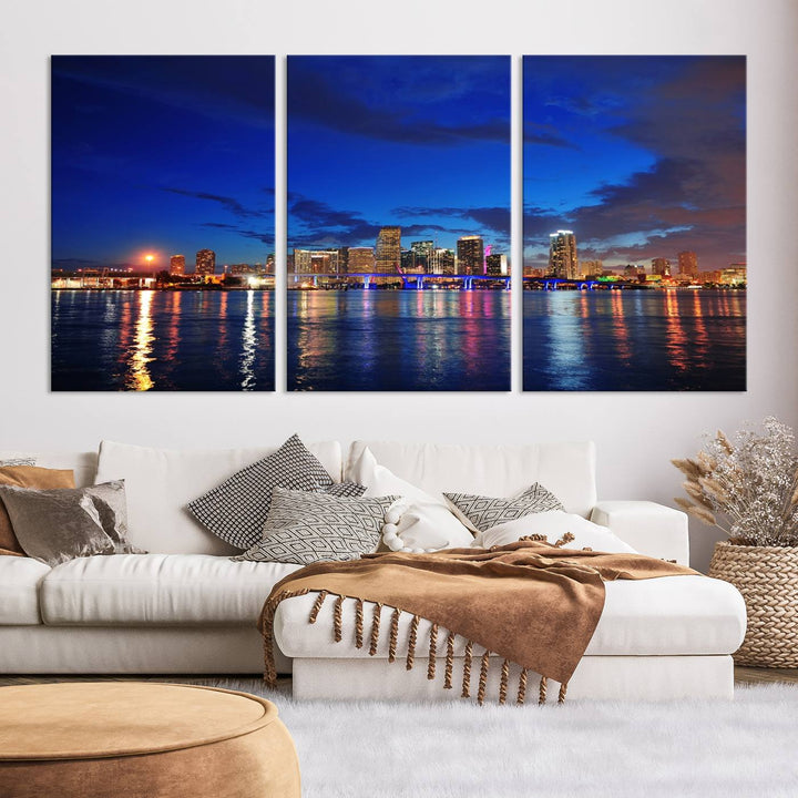 A large Miami City View Wall Art Canvas Print featuring the Miami City Skyline Panorama at night is displayed above the dresser.