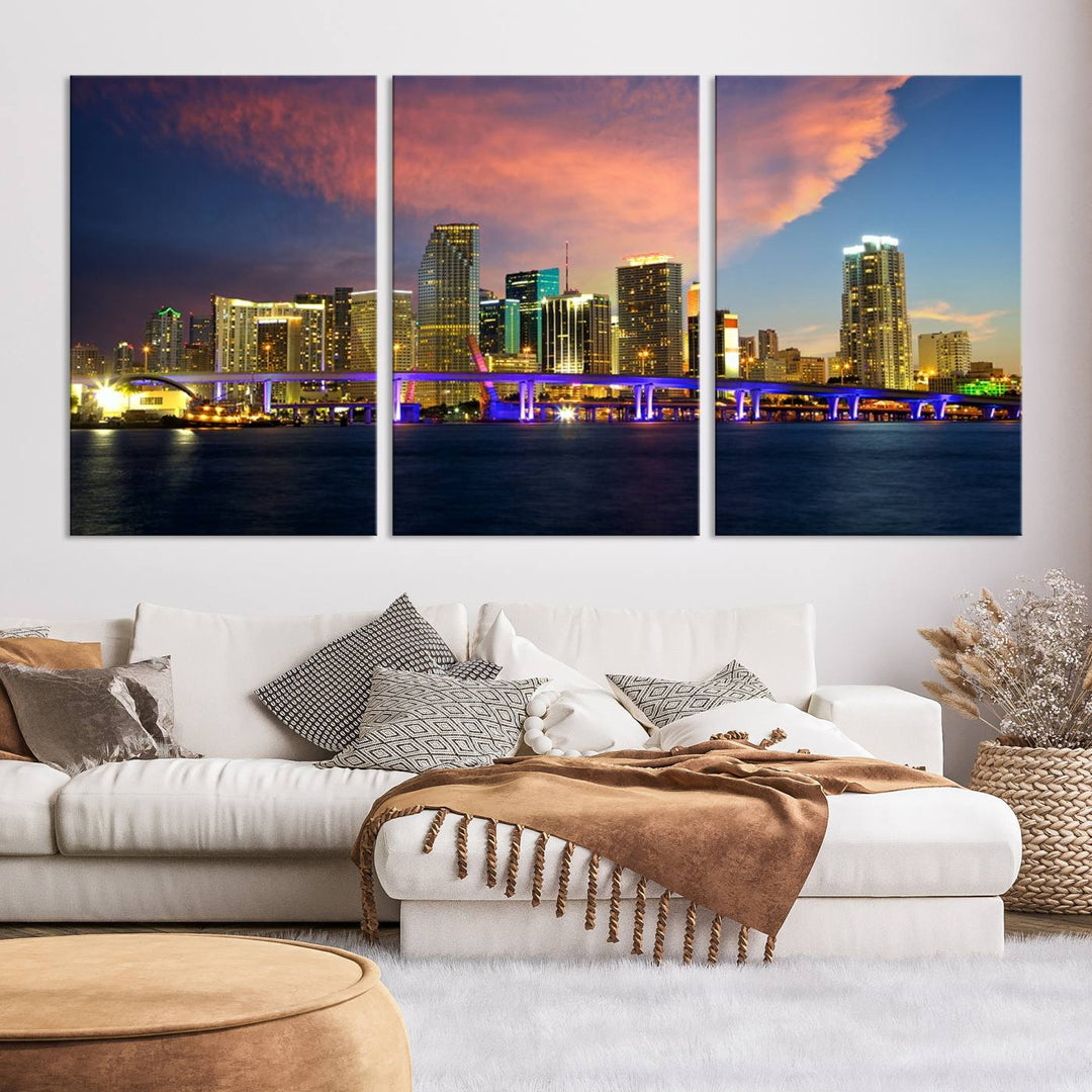 The modern living room is enhanced by the "Miami City Wall Art Canvas Print," a stunning triptych portraying a city skyline at sunset. These canvases are gallery wrapped and made from museum-quality materials, featuring a UV-protective coating to ensure lasting vibrancy.