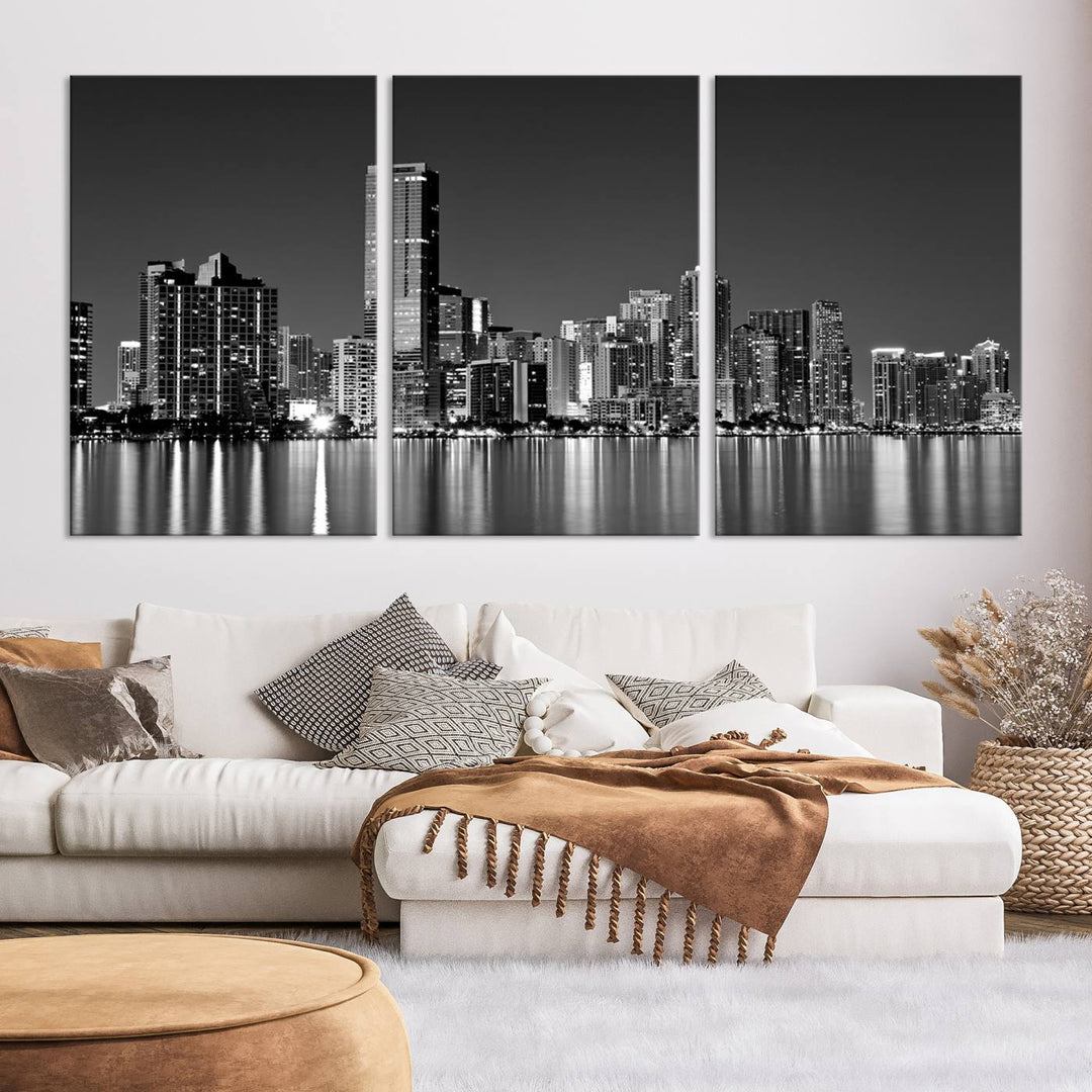 The Miami City Wall Art Canvas Print, a stunning triptych of the Miami skyline, elegantly hangs in this modern living room.