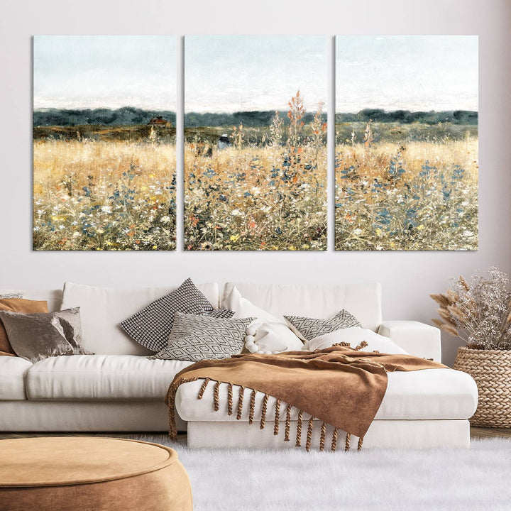 The "Wildflower Field Wall Art Canvas" brings rustic charm to the room with its nature-inspired landscape print, making it a perfect addition to the living room or office.