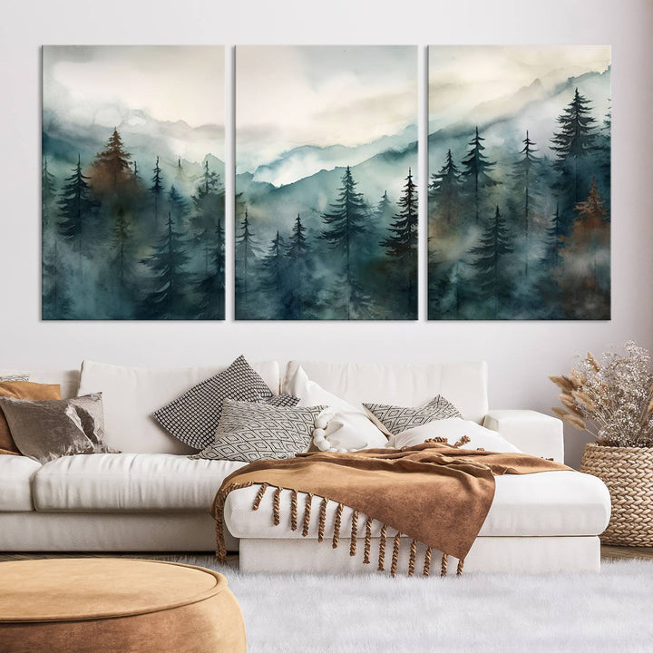 A set of Serenity Forest Wall Art Canvas prints, showcasing foggy mountain landscapes, is displayed in the living room.