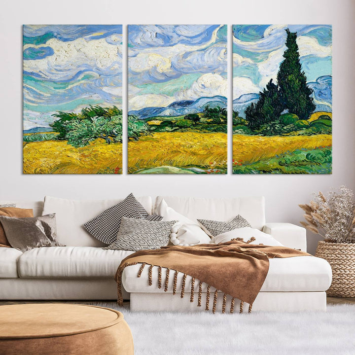 A contemporary living room features a large triptych of "Wheatfield With Cypresses By Van Gogh Painting Wall Art Canvas Print." Crafted on museum-quality canvas, this artwork brings a sense of elegance and craftsmanship reminiscent of professional artistry.