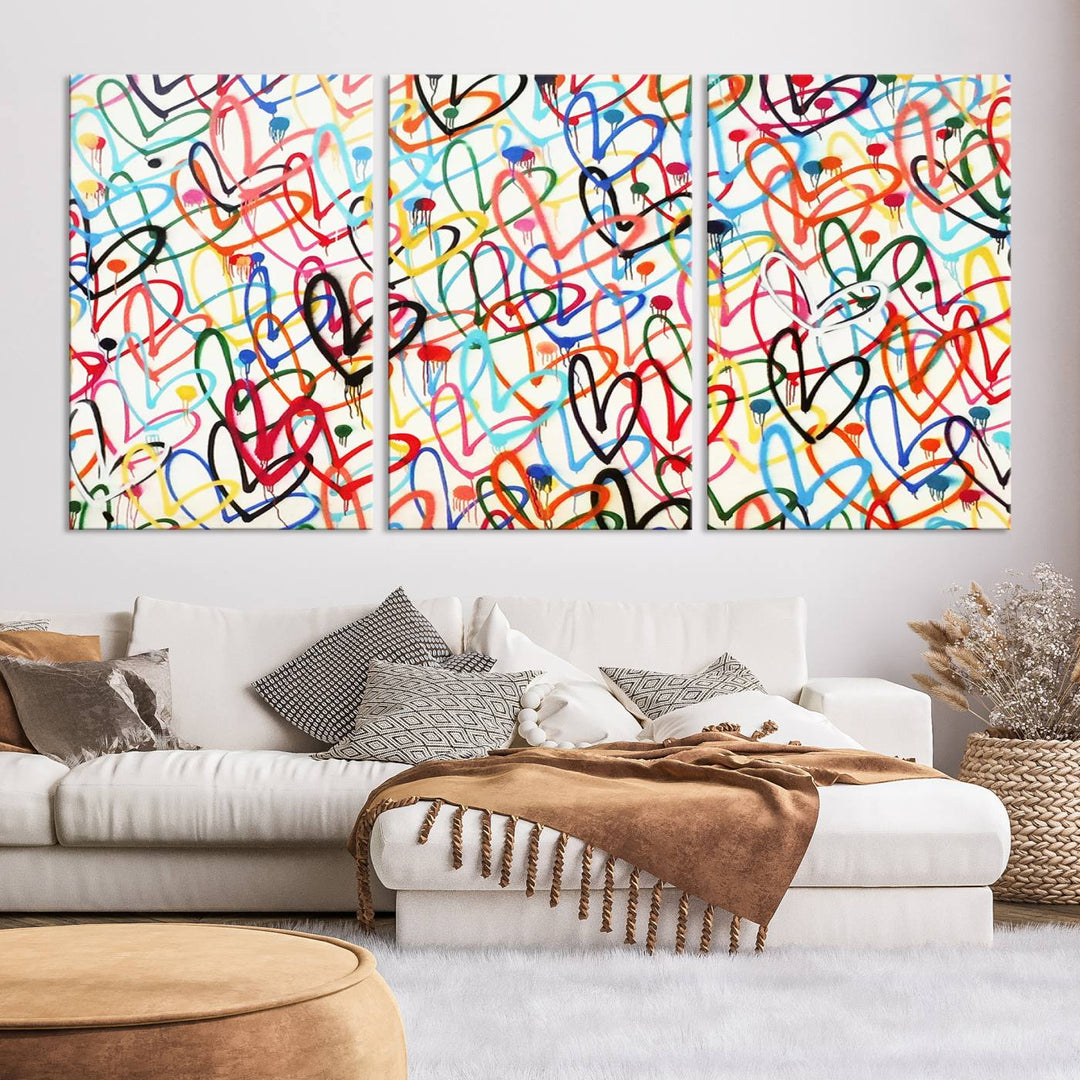 The "Colorful Love Canvas print," featuring vibrant abstract street art with overlapping loops, is handmade in the USA.