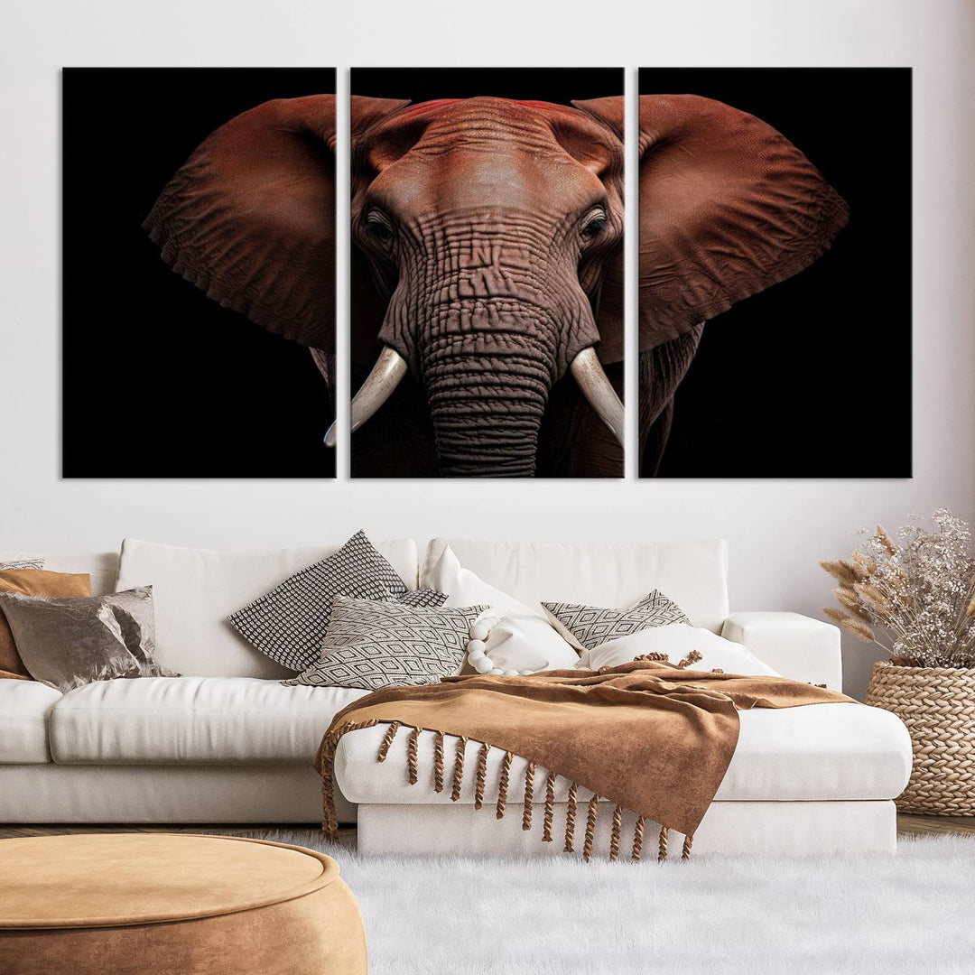 A stunning triptych titled "Wild Elephant Wall Art Canvas Print" beautifully enhances the wall above a contemporary living room. This Africa Savannah Wild Animal Wall Decor Print is of museum-quality, complete with a UV-protective coating to ensure its vibrancy and beauty are preserved for years.