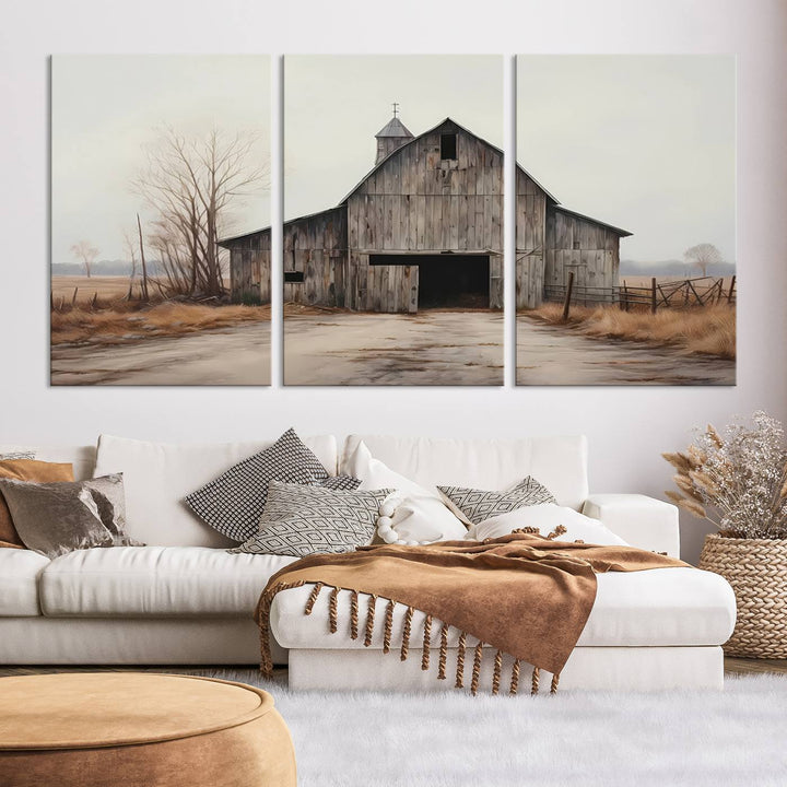 A framed and ready-to-hang Farmhouse Rustic Barn Wall Art Canvas Print is displayed against a gray wall. This stylish modern living room seamlessly combines rural life wall décor with contemporary comfort.