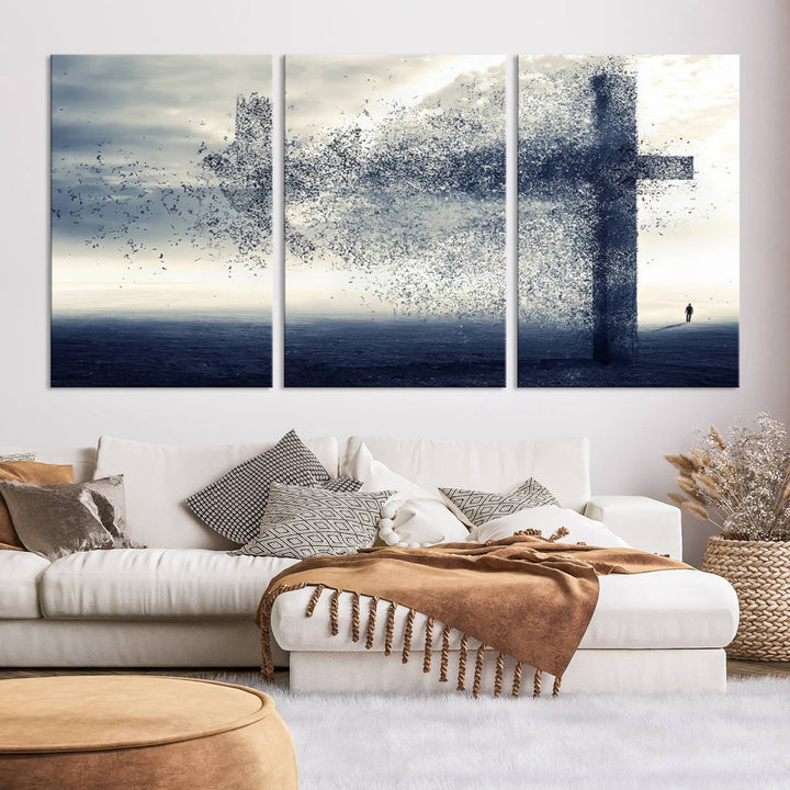 The "Jesus and the Fading Cross – Symbol of Faith" framed canvas print beautifully depicts a cross formed by birds against a moody sky above an ocean. This piece of Christian wall art infuses spirituality into the minimalist space.