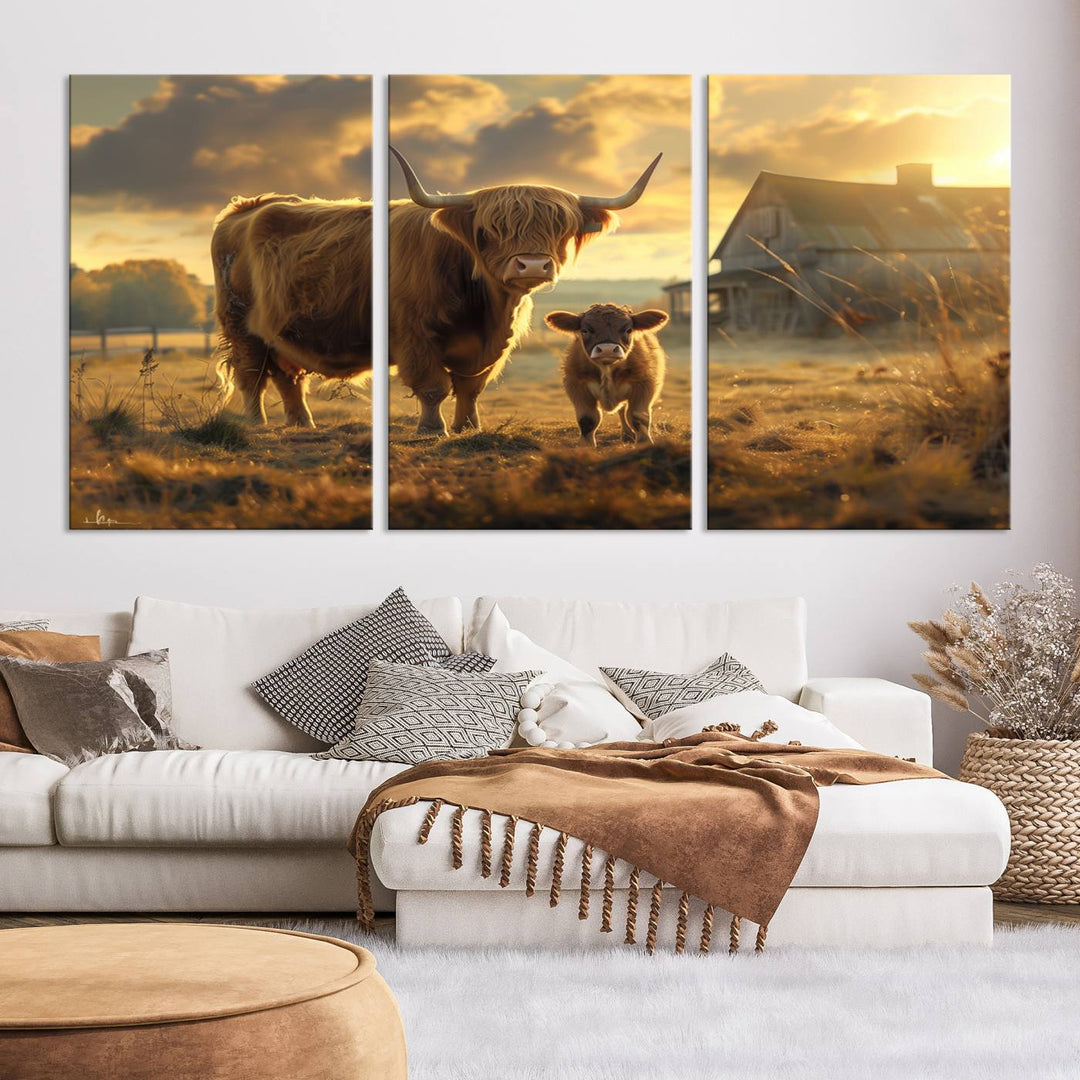 The "Highland Baby Cow Canvas Wall Art Animal Print" triptych art piece showcases a cow and calf in a sunlit field with a barn in the background.