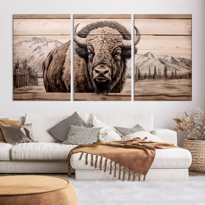 A stunning triptych artwork from the "Bison Canvas Wall Art American Buffalo Print Rustic Decor for Farmhouse Wall Art" collection graces the modern living room. Its vibrant colors are enhanced by museum-quality canvas and a UV-protective coating. The gallery-wrapped piece adds elegance to the space.