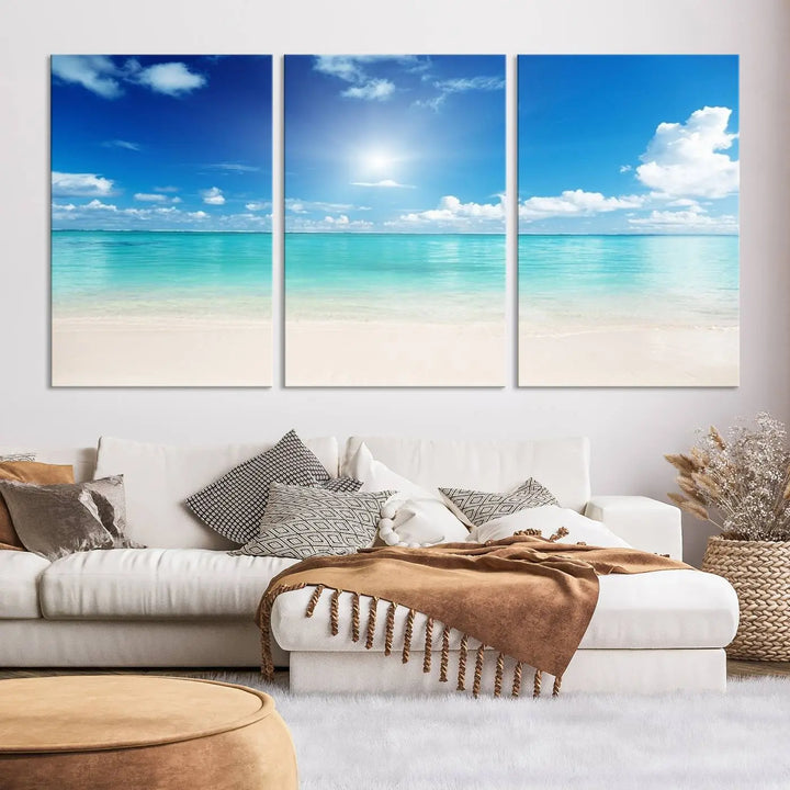 A contemporary living room showcasing the Wall Art Canvas Light Blue Beach and Ocean View.