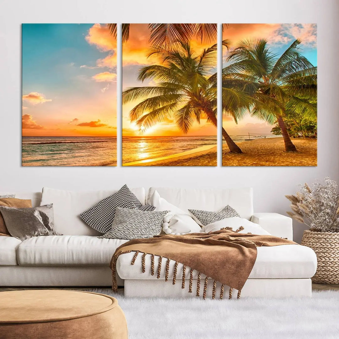 The Tropical Sunset Wall Art Print features a vibrant beach scene with palm trees and an ocean view highlighted by a golden sunset.