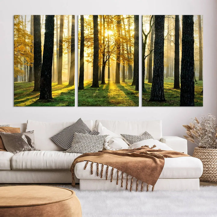 The living room is enhanced by the "Wall Art Landscape Canvas Print Tall Trees in Forest at Sunset" on museum-quality canvas. This triptych, complete with a UV-protective coating, is ready to hang and adds an artistic touch to the space.