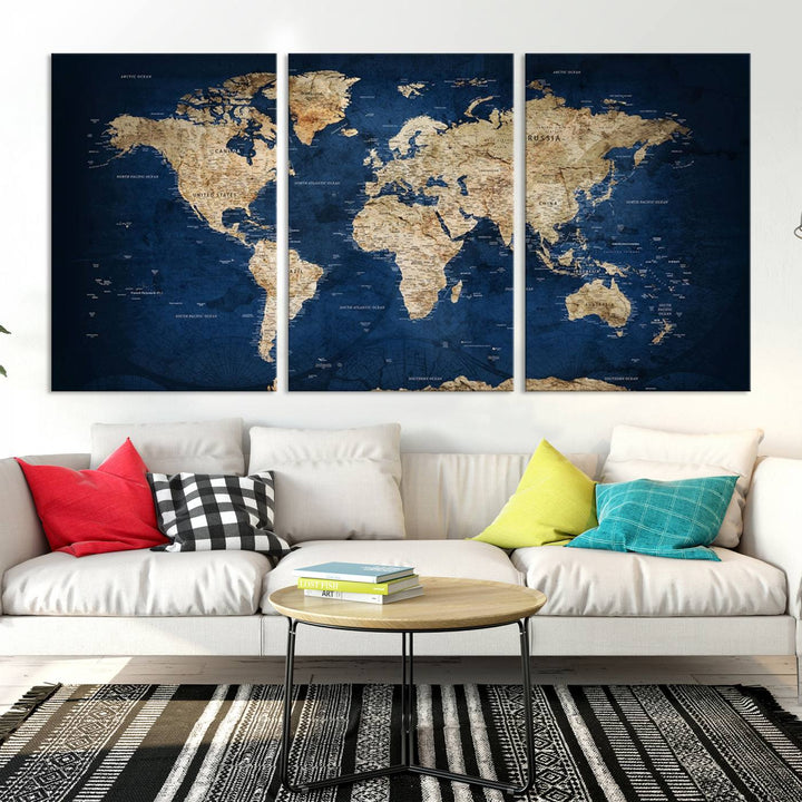 A triptych canvas print titled "Vintage Blue World Map Canvas Print - Classic World Map Design on Deep Blue Wall Art Print" adorns the wall, enhancing the decor with its antique style.