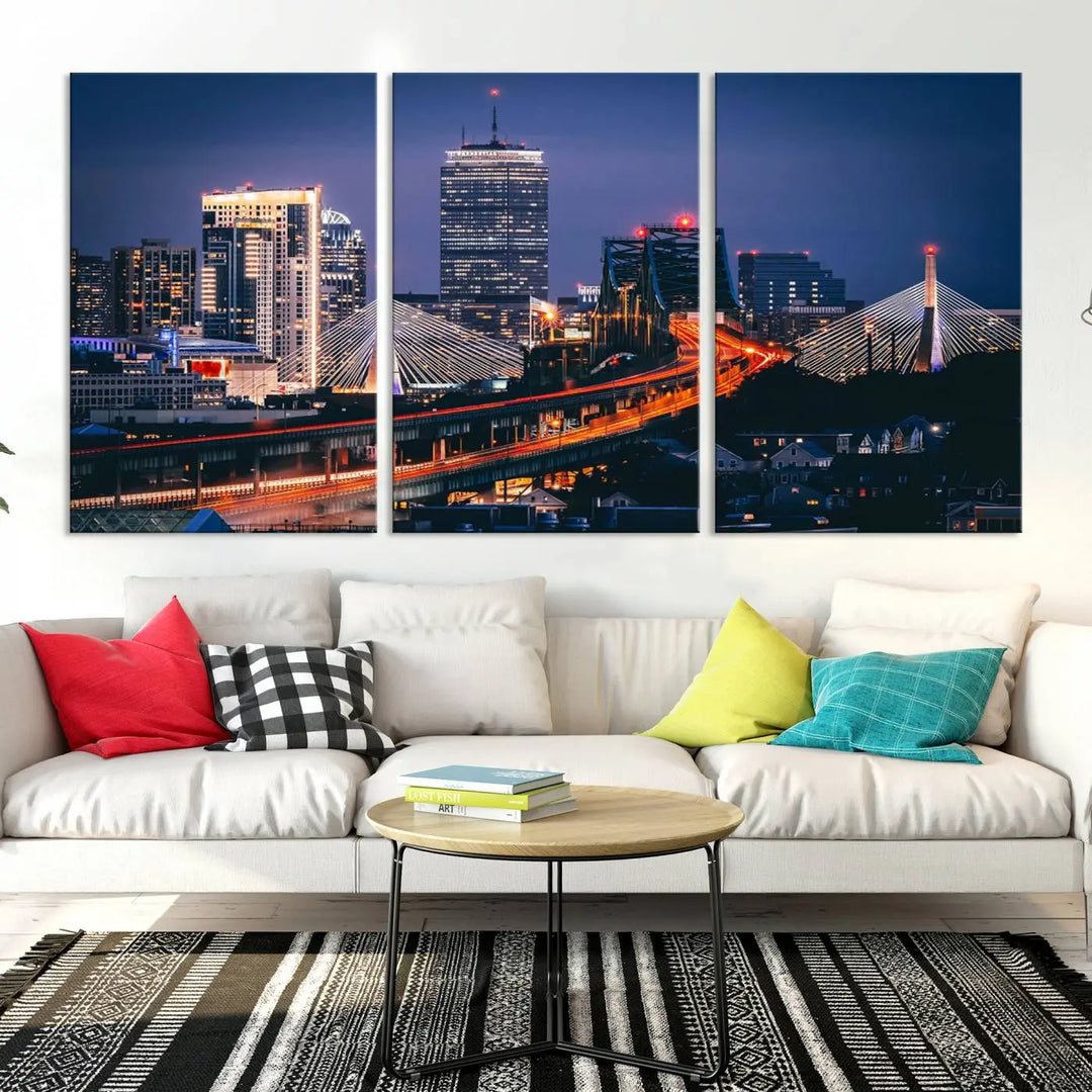 The "Boston City Lights Night Skyline Cityscape View" artwork on the wall showcases a brightly lit bridge at night. It is displayed on museum-quality canvas with a UV-protective coating.