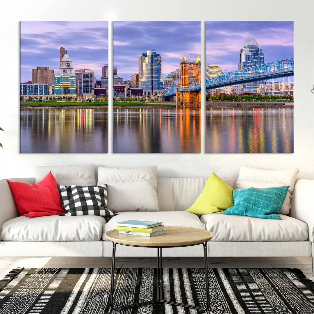 The wall art titled "Cincinnati City Lights Sunset Purple Cloudy Skyline Cityscape View" is beautifully printed on museum-quality canvases with a UV-protective coating and is ready to hang.