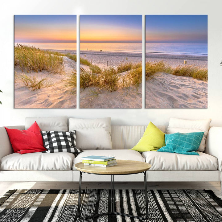 The "Sunset Silence on the Beach" wall art canvas print features a serene beach scene at sunset on museum-quality canvas with a UV-protective coating.