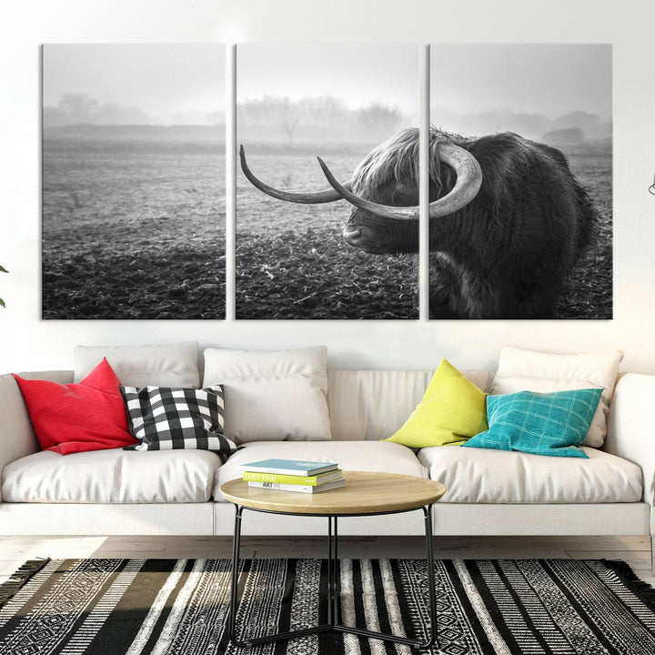 The living room features a three-panel wall art of a highland cow in a foggy field, using the Cow Wall Art Canvas Print for visual impact. This museum-quality canvas includes UV-protective coating to ensure longevity.