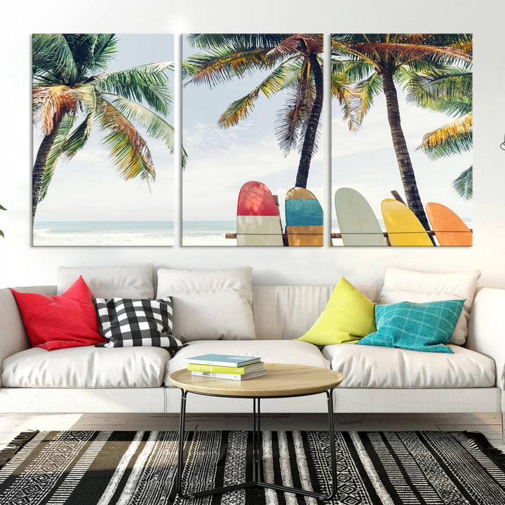 The room showcases The Palm and Surfing Board Wall Art Canvas Print, a triptych of palm trees and surfboards by the beach, elegantly gallery wrapped for a sophisticated finish.