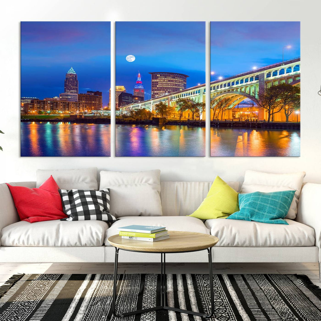 The Cleveland Night Skyline Wall Art City Cityscape Canvas Print portrays a city skyline and bridge lit up against the night sky. This artwork is printed on museum-quality canvas with a gallery-wrapped finish and features a UV-protective coating to ensure lasting vibrancy.