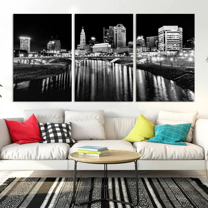 The living room showcases the Columbus City Lights Skyline Black and White Wall Art Cityscape Canvas Print.