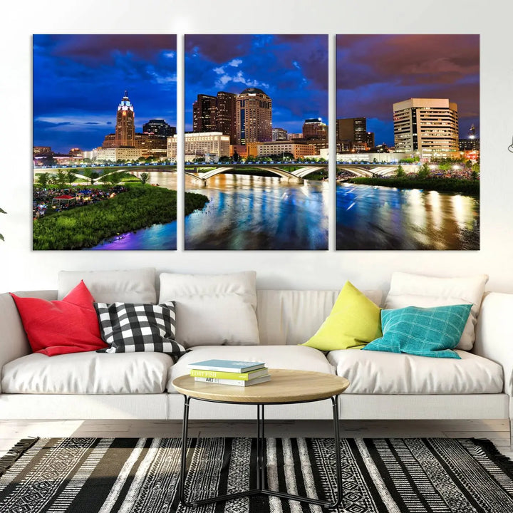 Columbus City Lights Night Bright Blue Cloudy Skyline Cityscape View Wall Art Canvas Print, gallery wrapped on museum-quality canvas, reflecting on a river.