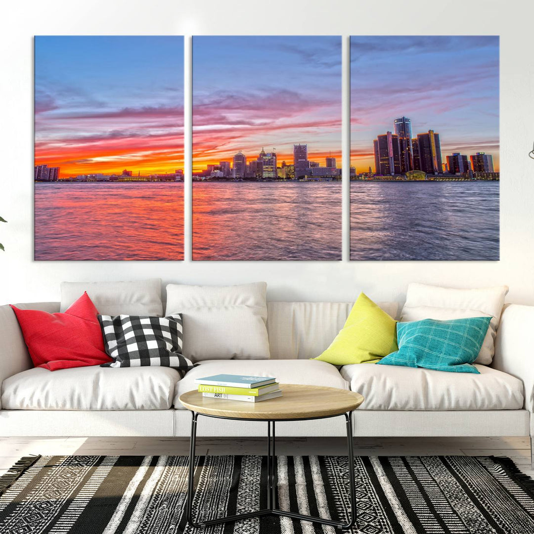 The Detroit City Lights Sunset Colorful Cloudy Skyline Cityscape View Wall Art Canvas Print showcases a vibrant city skyline at sunset over water. The artwork is museum-quality, comes ready to hang, and features a UV-protective coating to preserve its vivid colors.