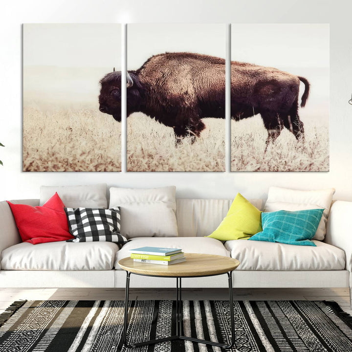 A stylish living room showcases the captivating "Bison in Field" Wall Art Canvas Print as farmhouse decor.