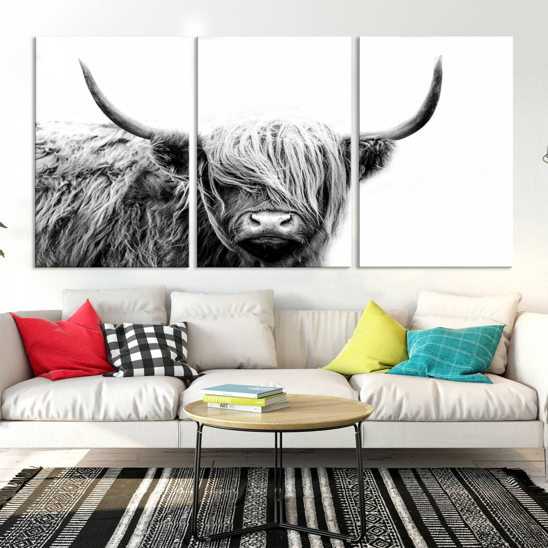 A museum-quality triptych titled "Black White Scottish Highland Cow Cattle Art Print Farmhouse Wall Art Canvas Print" embellishes the dark wall. The canvas is equipped with a UV-protective coating to ensure lasting vibrancy.