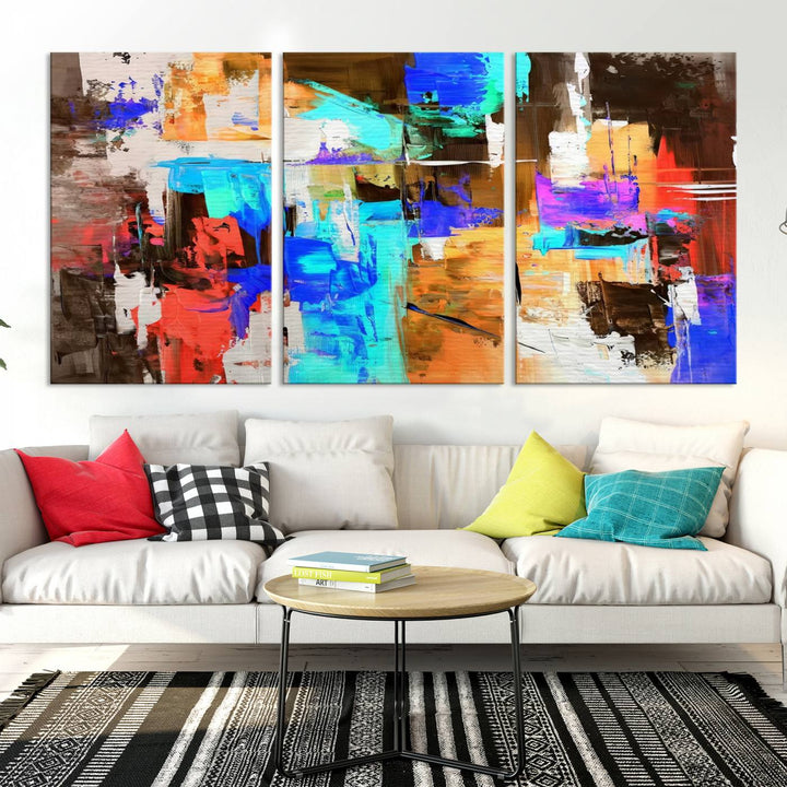 In a modern living room, the "Colorful Abstract Wall Art Canvas Print" serves as a stunning triptych centerpiece on museum-quality canvas, ready to hang. Its UV-protective coating ensures enduring vibrancy.