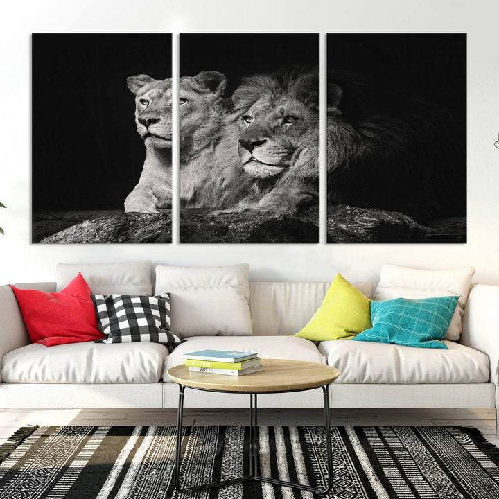 The elegant wildlife portrait, "Lion Couple Canvas Wall Art Print," featuring a black and white depiction of a lion family, majestically decorates the living room wall.