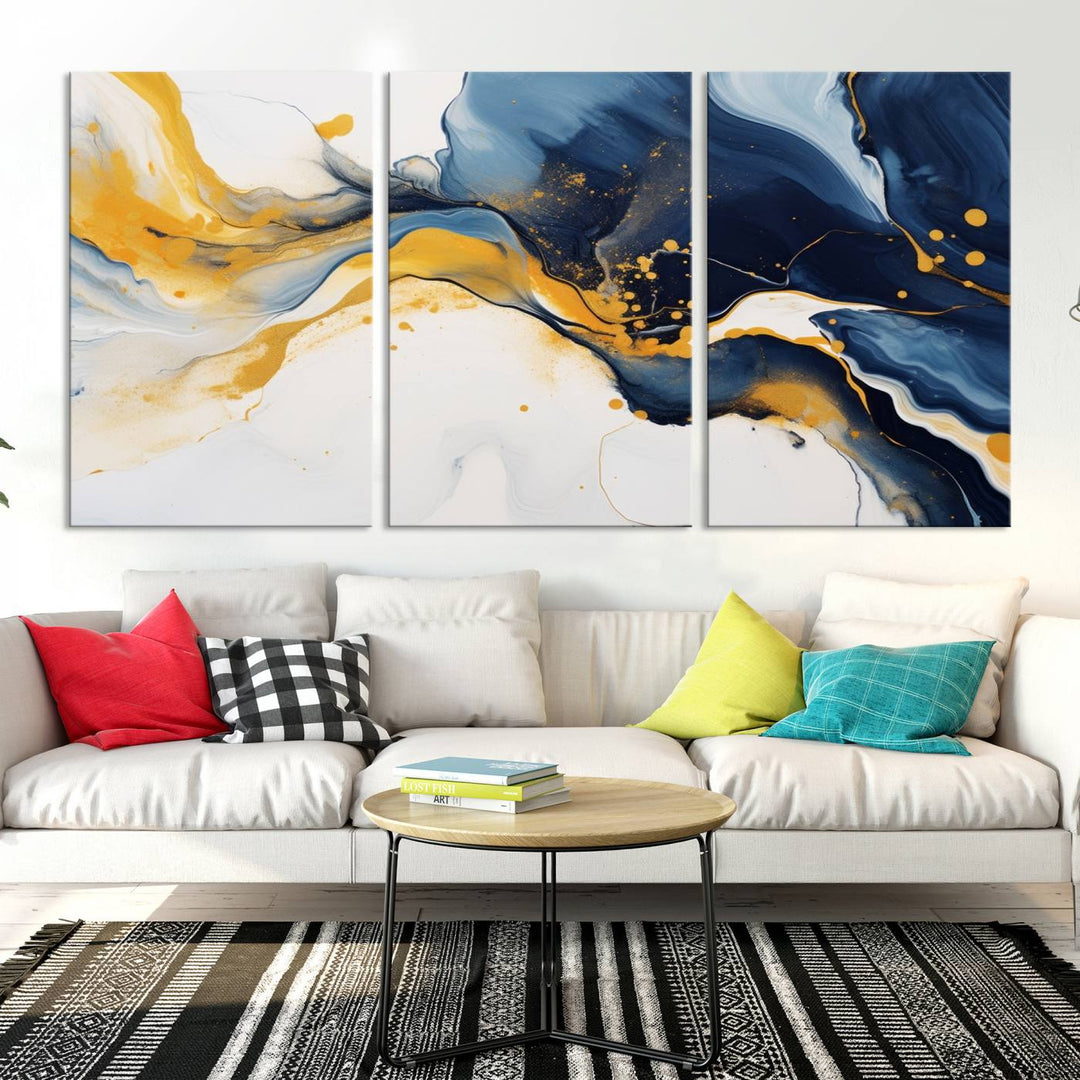 The Blue and Gold Abstract Fluid Canvas Art, with its swirling patterns, adorns the wall. This modern wall art beautifully complements the contemporary interior decor, adding an elegant touch with its rich blue, gold, and white tones.