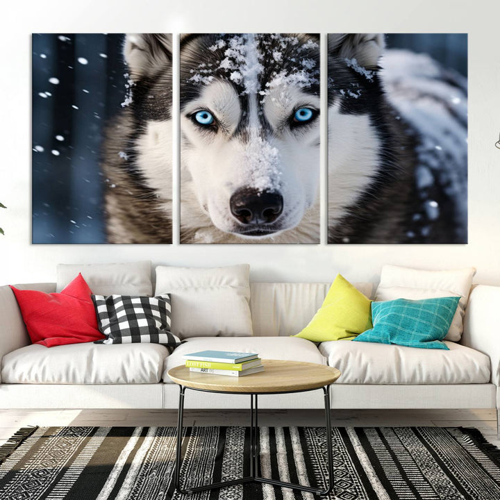 A digital art piece titled "Winter Siberian Husky Wolf Wall Art Canvas Print" showcases a blue-eyed husky blanketed in snow. Printed on high-quality canvas, it is an ideal choice for nature and dog enthusiasts.