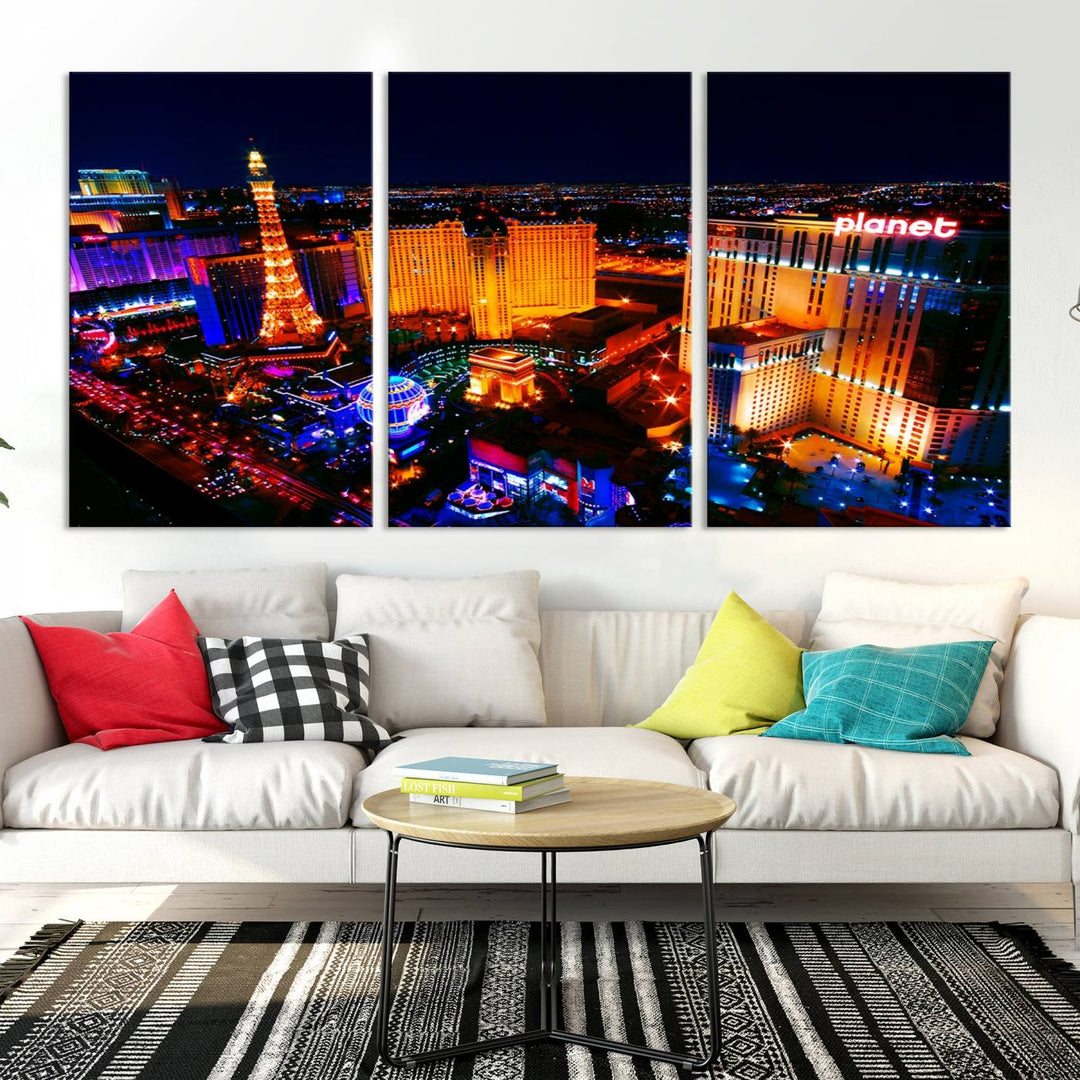 Las Vegas Wall Art Canvas Print showcases a dynamic and luminous cityscape at night with tall buildings and bustling streets. Expertly printed on museum-quality canvas, this gallery-wrapped artwork is enhanced with a UV-protective coating to ensure lasting brilliance.