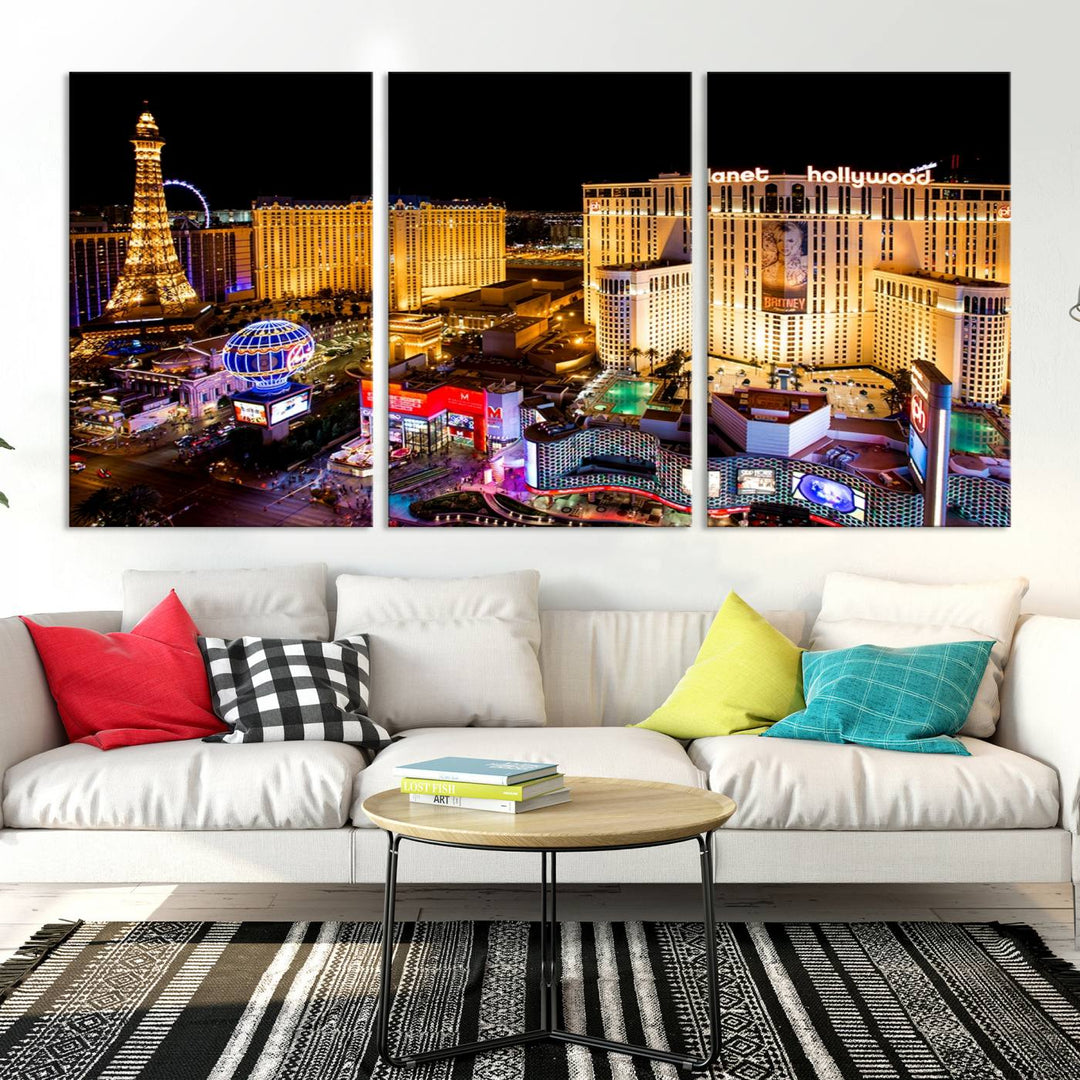 The Las Vegas Wall Art Canvas Print is a triptych set that showcases a stunning night view of Las Vegas. The illuminated buildings and the iconic faux Eiffel Tower add elegance to any space. Each piece comes with a UV-protective coating and is ready to hang, ensuring both style and durability.