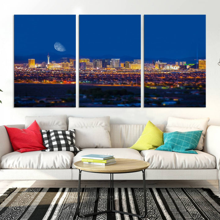 The Las Vegas Wall Art Canvas Print, depicting a city skyline at night, enhances a modern living room with its museum-quality canvas. This triptych comes ready to hang and boasts a UV-protective coating for lasting brilliance.