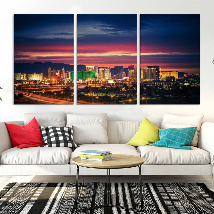 The living room is adorned with the Las Vegas Wall Art Canvas Print, a triptych showcasing a cityscape at sunset. This piece is crafted on museum-quality canvas and protected by a UV-coated finish, highlighting the craftsmanship of a skilled professional.