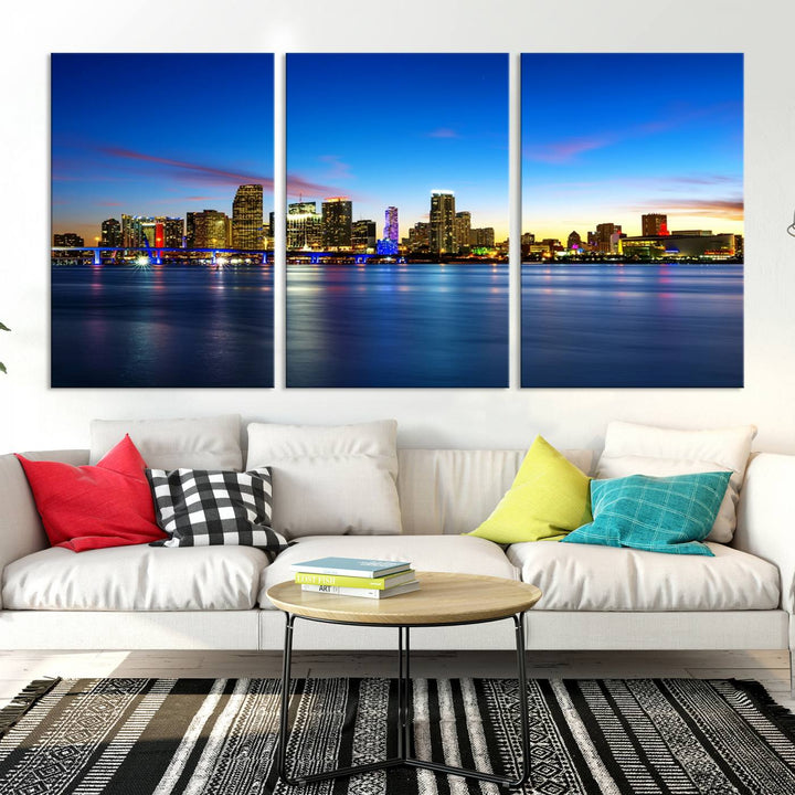 The living room features a Miami City Wall Art Canvas Print—a gallery-wrapped triptych displaying a city skyline at dusk, adding museum-quality elegance to the space.