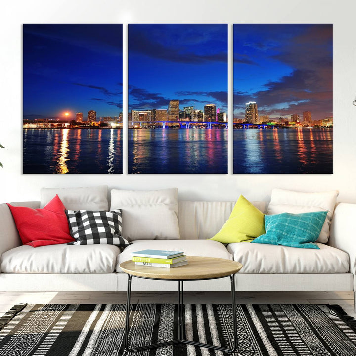 A large Miami City View Wall Art Canvas Print featuring the Miami City Skyline Panorama at night is displayed above the dresser.