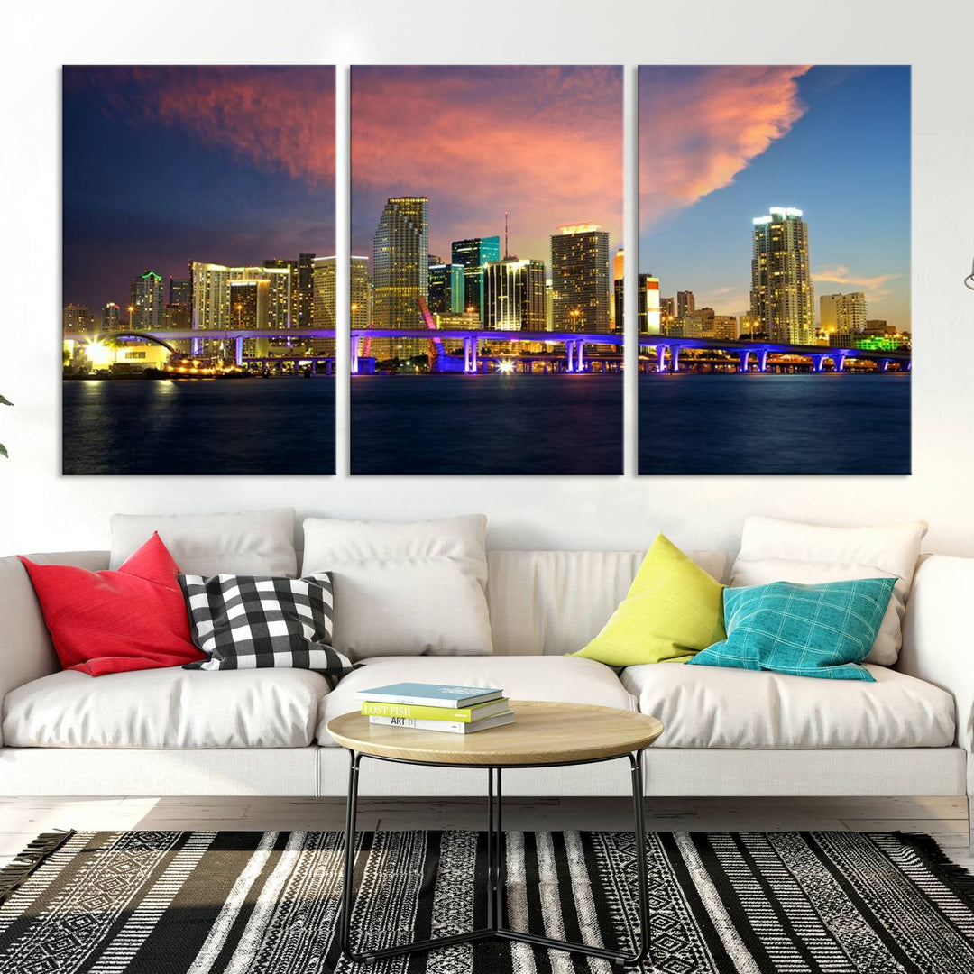 The modern living room is enhanced by the "Miami City Wall Art Canvas Print," a stunning triptych portraying a city skyline at sunset. These canvases are gallery wrapped and made from museum-quality materials, featuring a UV-protective coating to ensure lasting vibrancy.