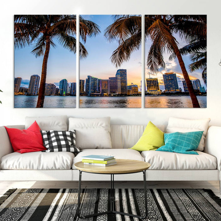 The Wall Art MIAMI Canvas Print features a triptych design depicting palm trees and a city skyline at sunset.