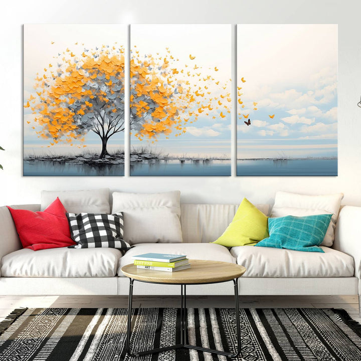 Abstract tree with yellow butterflies canvas wall art in a modern living room setting.