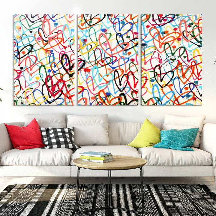 The "Colorful Love Canvas print," featuring vibrant abstract street art with overlapping loops, is handmade in the USA.