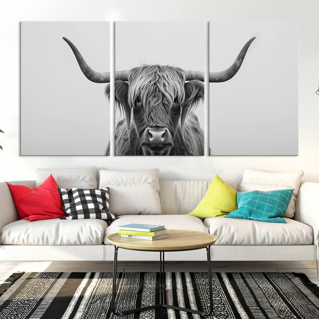 A triptych titled "Farmhouse Longhorn Wall Art Canvas Print, Longhorn Texas Wall Art Canvas Print," rendered in a gallery-quality finish, hangs prominently on the wall.