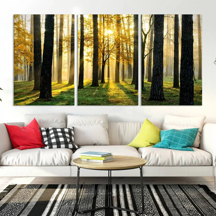 The living room is enhanced by the "Wall Art Landscape Canvas Print Tall Trees in Forest at Sunset" on museum-quality canvas. This triptych, complete with a UV-protective coating, is ready to hang and adds an artistic touch to the space.