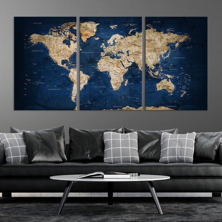 A triptych canvas print titled "Vintage Blue World Map Canvas Print - Classic World Map Design on Deep Blue Wall Art Print" adorns the wall, enhancing the decor with its antique style.