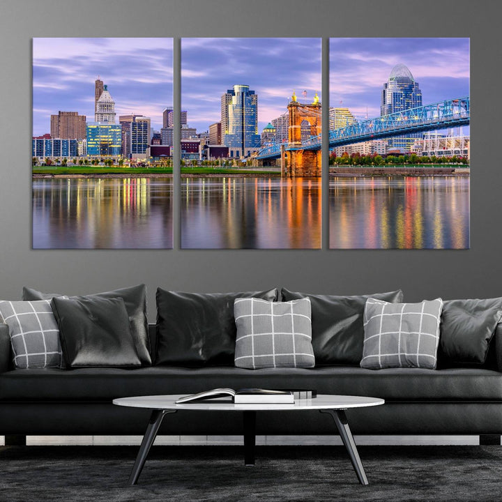 The wall art titled "Cincinnati City Lights Sunset Purple Cloudy Skyline Cityscape View" is beautifully printed on museum-quality canvases with a UV-protective coating and is ready to hang.