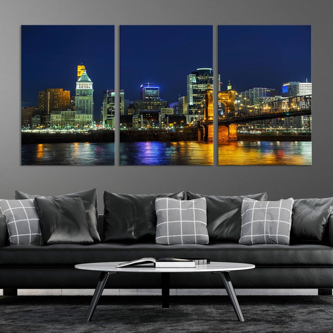 The "Cincinnati City Lights Night Skyline Cityscape" canvas print, displayed above a sofa, exhibits museum-quality craftsmanship with a UV-protective coating.