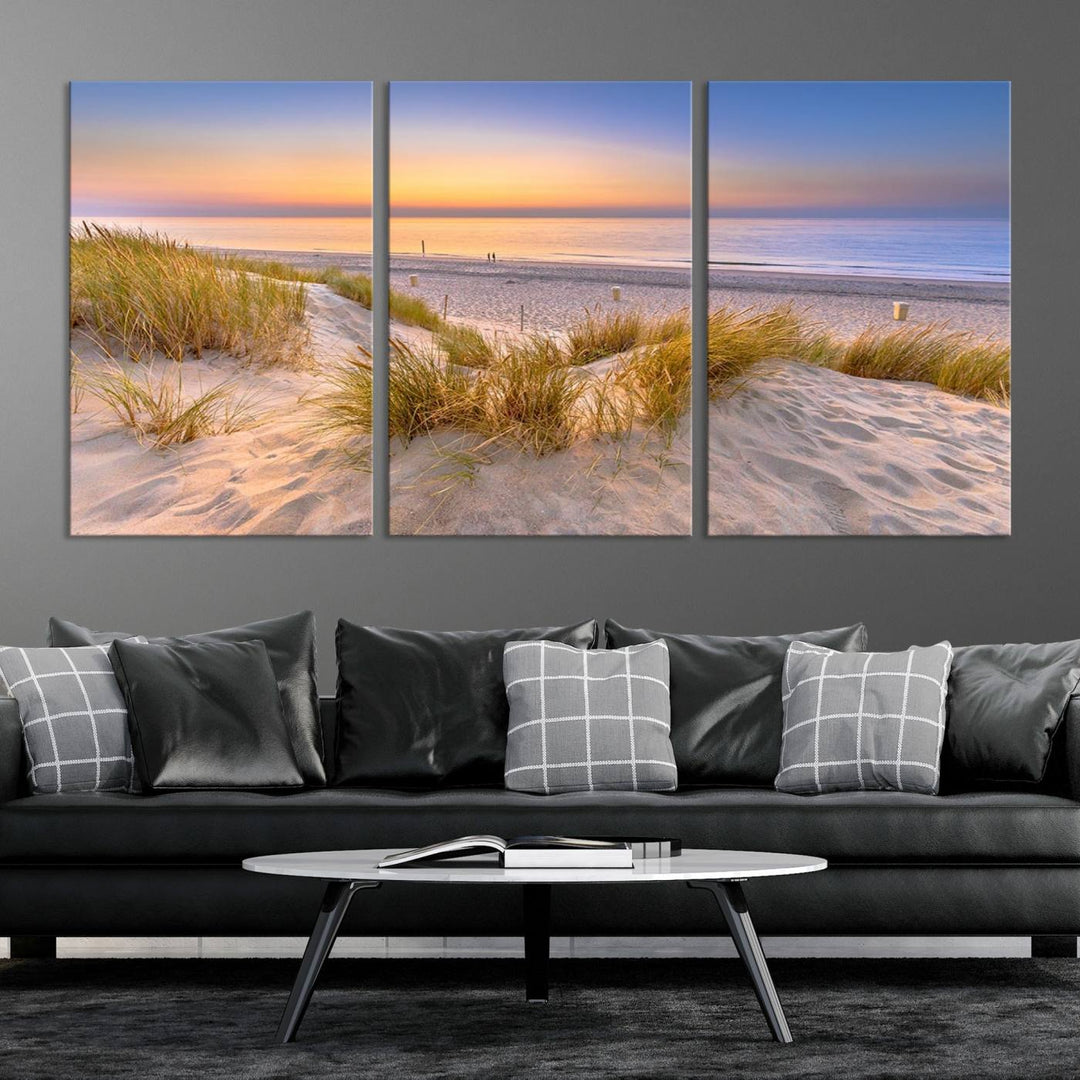 The "Sunset Silence on the Beach" wall art canvas print features a serene beach scene at sunset on museum-quality canvas with a UV-protective coating.