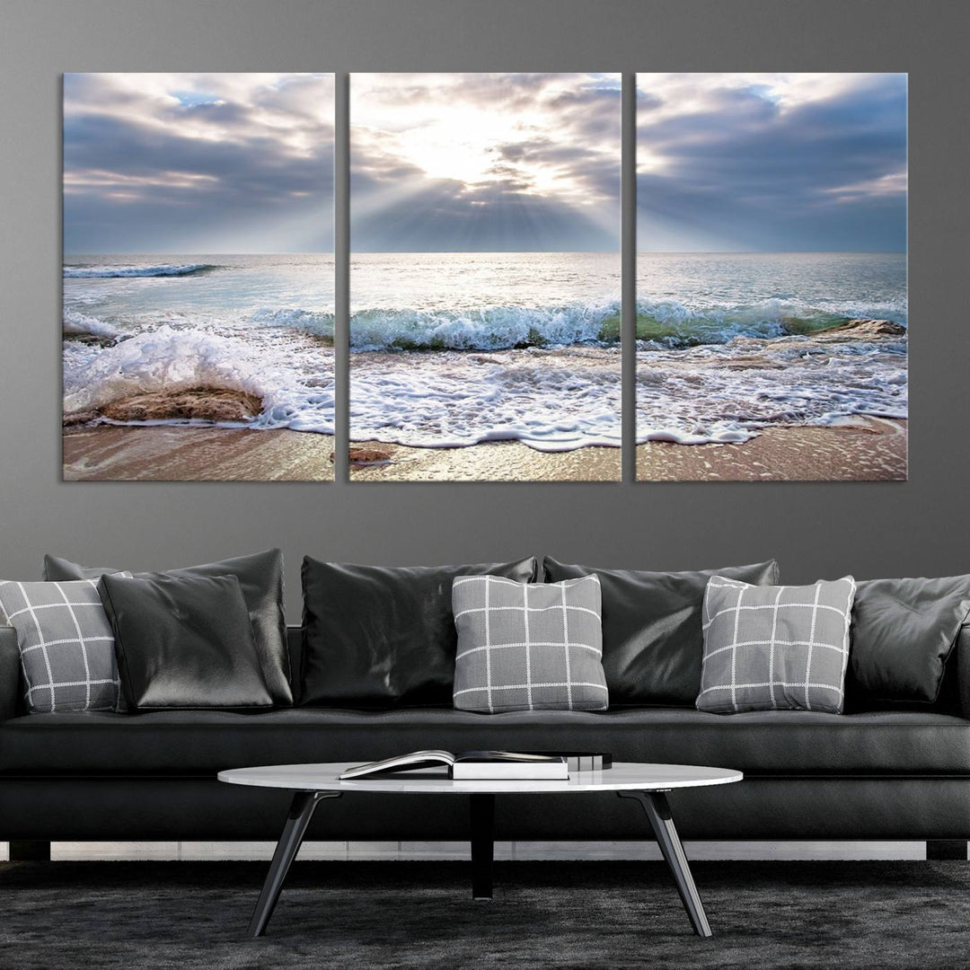 Sunset At The Beach Wall Art Canvas Print, showcasing a triptych of a tranquil ocean view with waves and sun rays, is printed on museum-quality canvas with UV-protective coating. Enjoy this artistic elegance with free shipping.